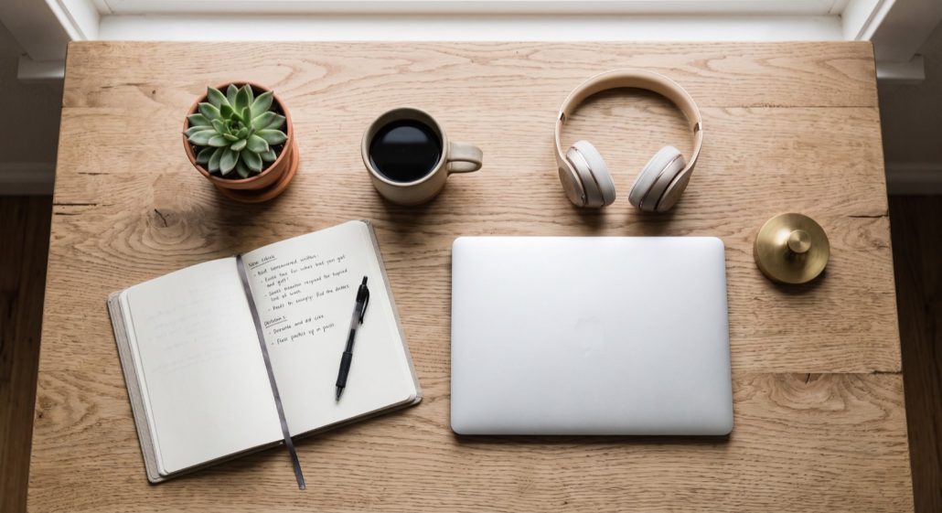 Flat lay photo style example of a desk shot from directly above